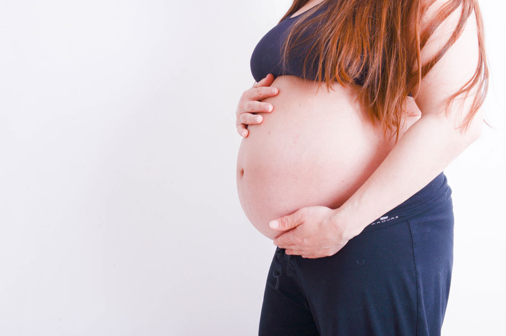 Belly of pregnant woman